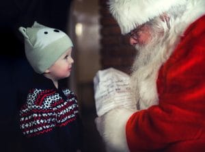 Santa Claus and child sharing joy and happiness in Rotherham