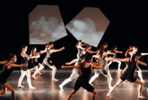 Group of young students performing modern dance at Rotherham College Performing Arts