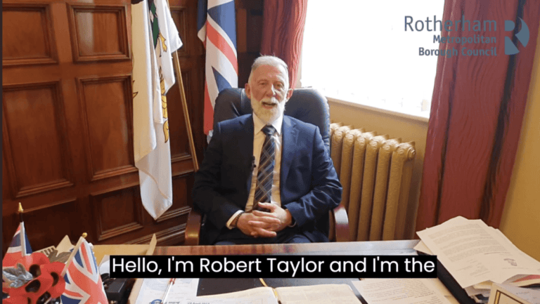 Mayor Robert Taylor of Rotherham sitting in his office chair.